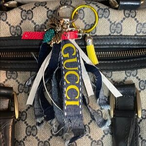 SOLD SOLD Gucci Monogram Canvas Bag shows off. Stunning Colorful Tassel Keychain